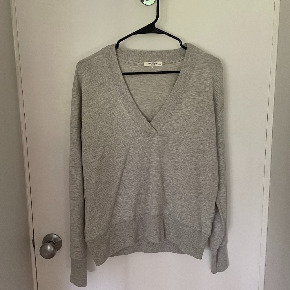 light grey sweater